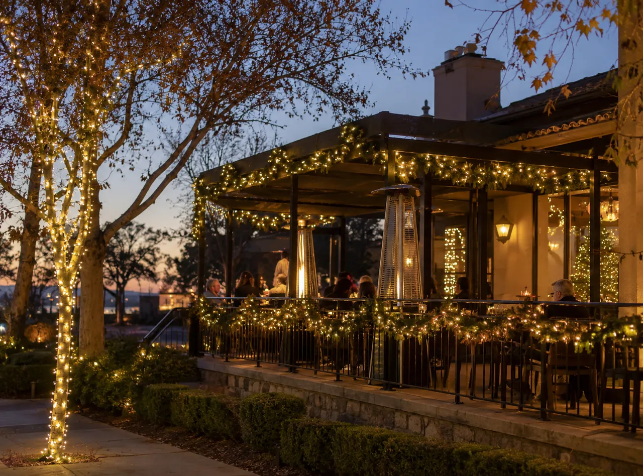 Commercial Christmas Lights in Fishers - IN being arranged across a retail center entrance canopy